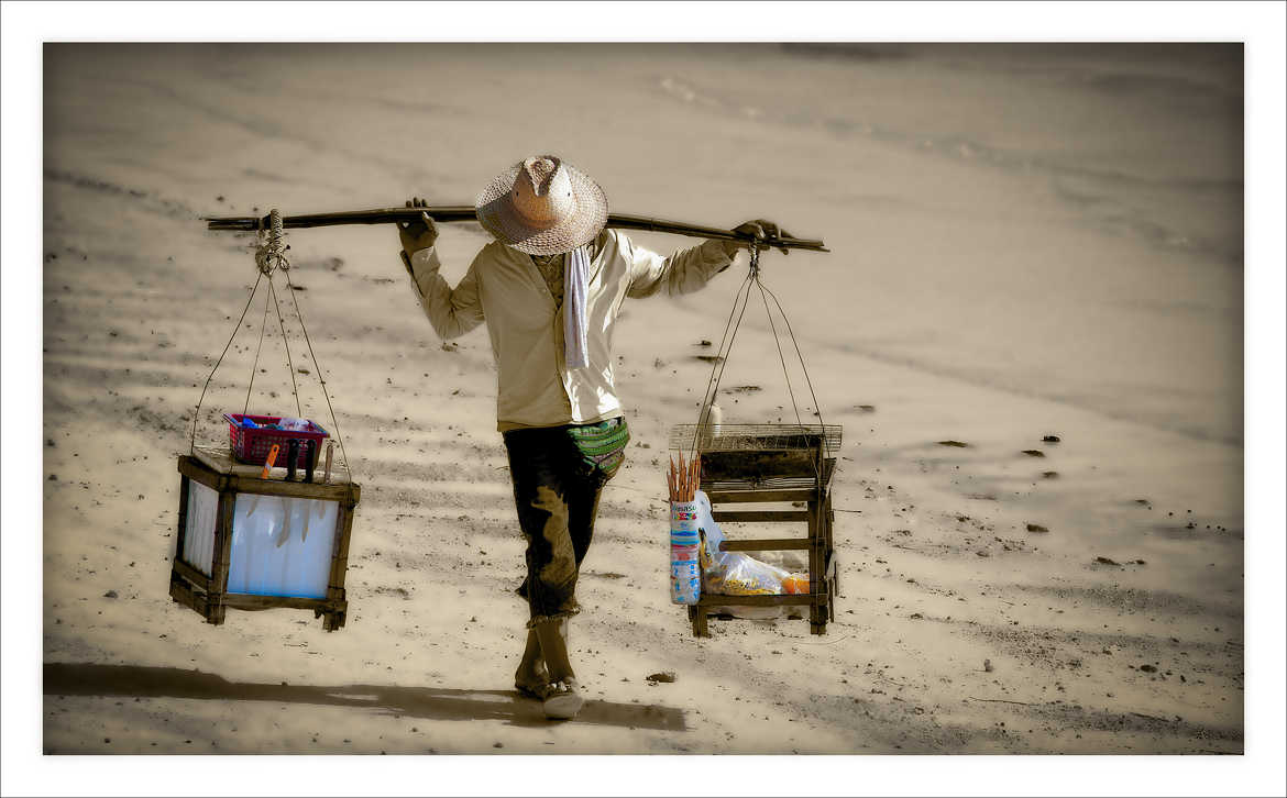 Worker on the beach