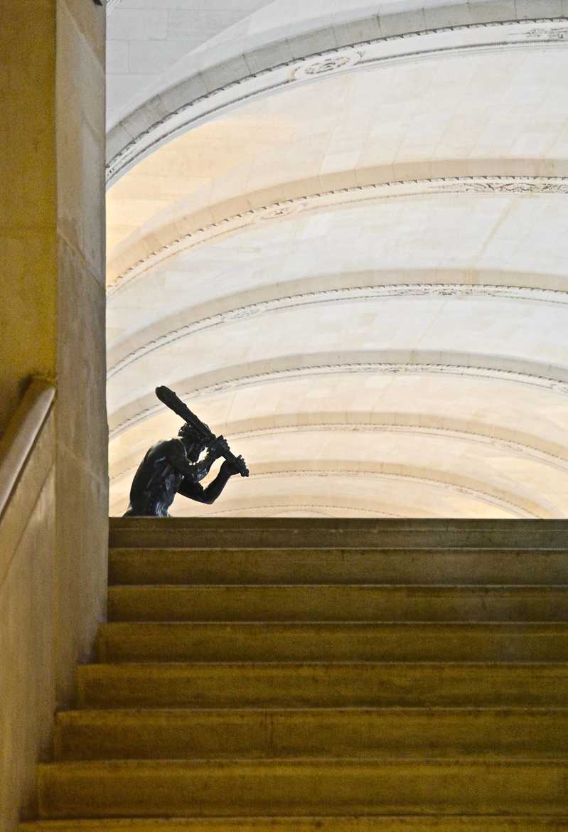 Hercule en haut de l'escalier