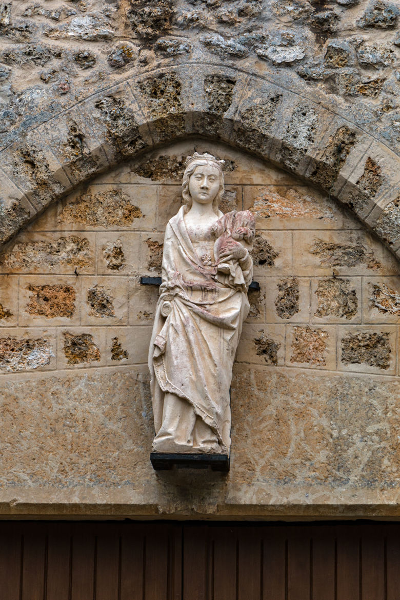 statue porche église de Senlisse