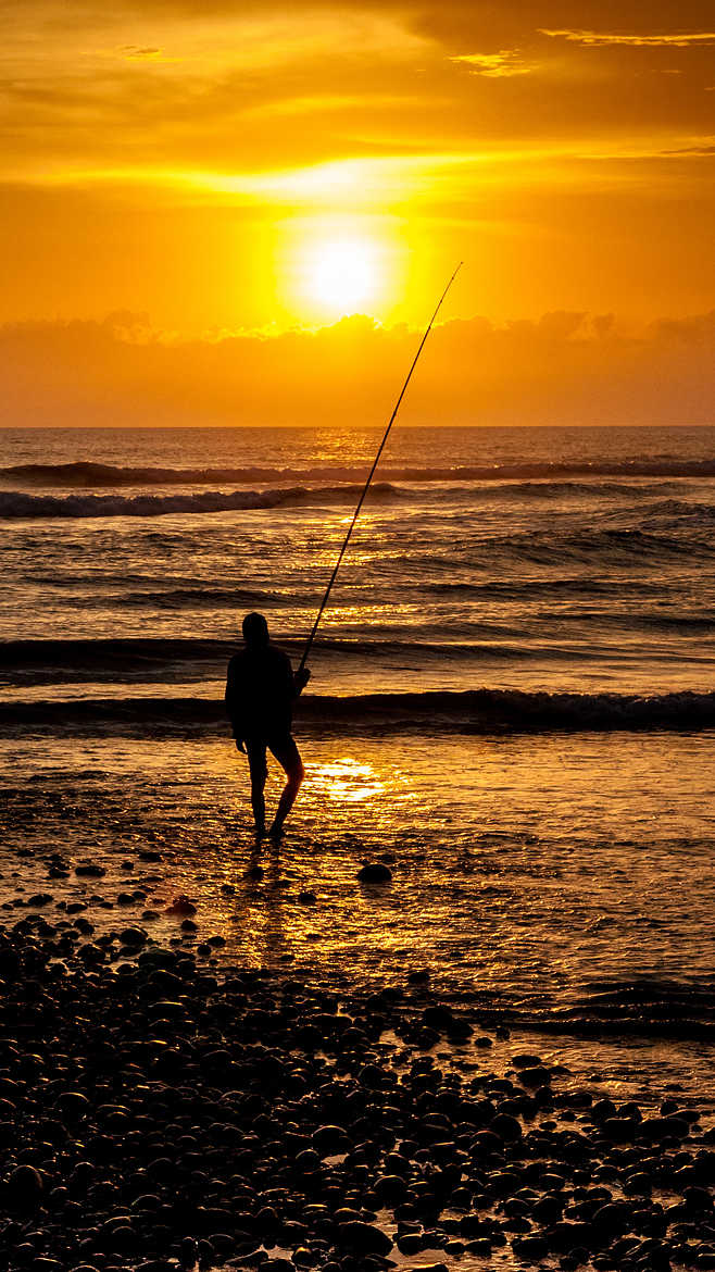Le coucher de soleil du pêcheur
