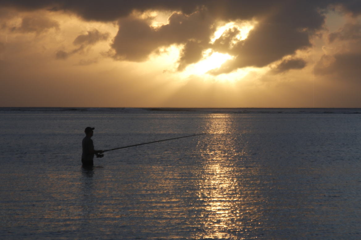 le pecheur du coucher de soleil