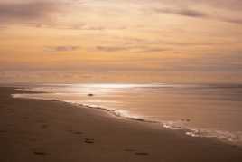 Je courais sur la plage abritée des alizés