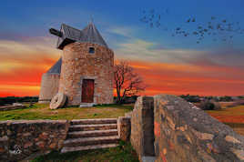 Moulin au couché du soleil