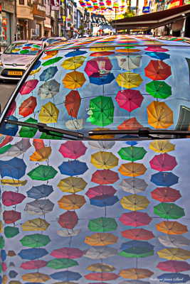 Parapluies sous le soleil